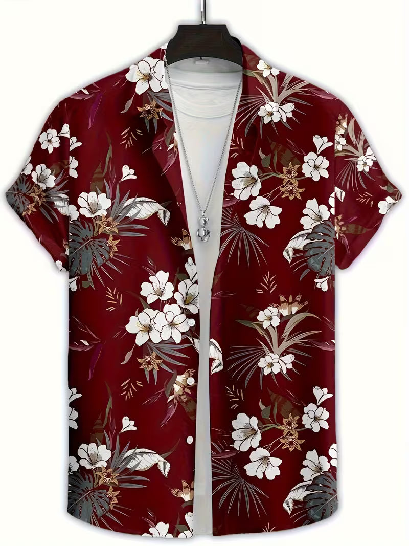 A short-sleeve button-up camp shirt with a red base and a white, gray, and brown tropical floral print, displayed on a hanger over a white t-shirt.