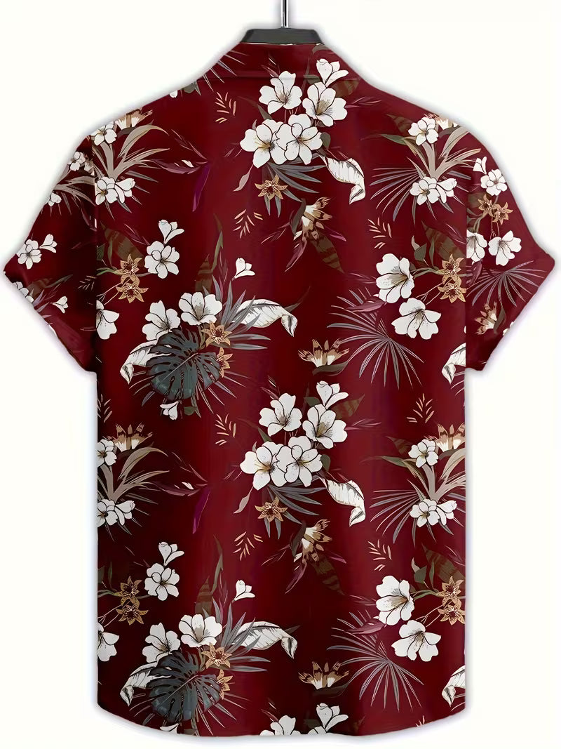 A short-sleeve button-up camp shirt with a red-burgundy tropical floral print, featuring white hibiscus flowers, green palm leaves, and brown accents, displayed on a hanger against a white background.
