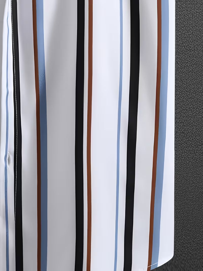 A close-up of a white fabric with vertical stripes in black, brown, light blue, and a thin red stripe, next to a dark gray textured surface.