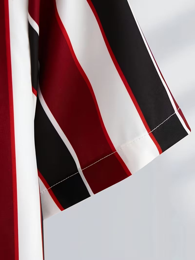 Close-up of a striped garment sleeve with bold red, black, and white vertical stripes and fine red and white edging.