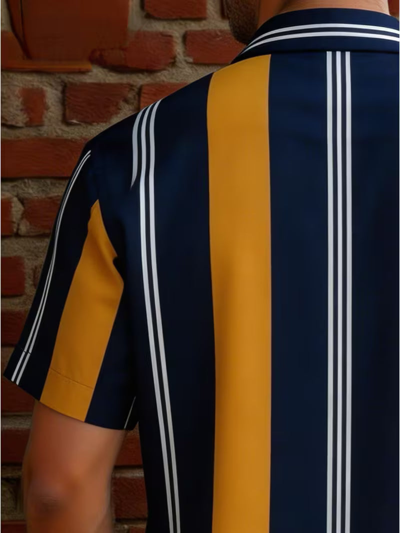 A close-up back view of a person wearing a short-sleeve collared shirt with bold vertical stripes in navy blue, mustard yellow, and white, set against a red brick wall background.