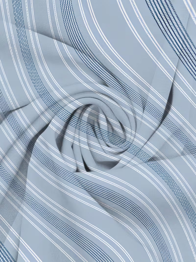 A close-up of a light blue fabric with a pattern of thin white and dark navy blue stripes, arranged in a swirling, draped texture.