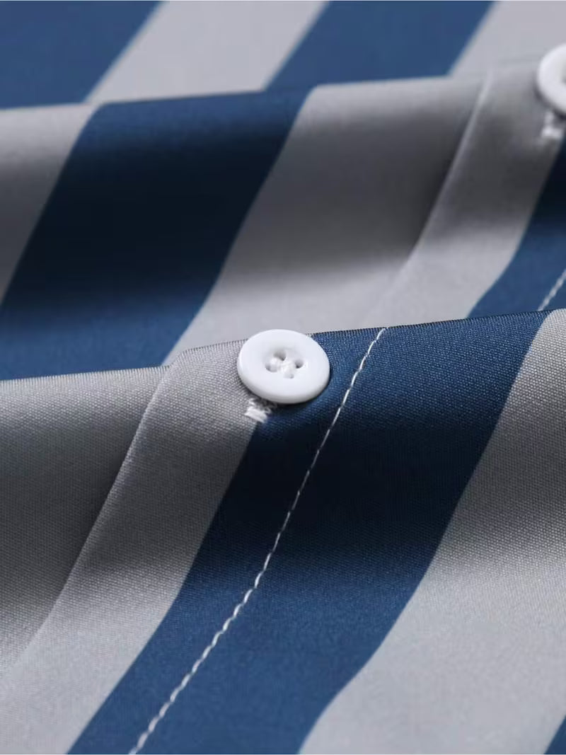 Close-up of a striped shirt fabric with alternating navy blue and light gray diagonal bands, featuring a white button and visible stitching.