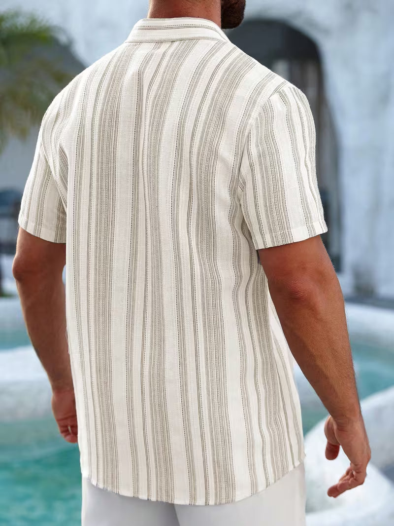 Person wearing a beige striped shirt by a pool