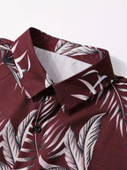 Maroon shirt with white leaf pattern on a white background