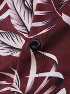 Close-up of a button on a shirt with leaf pattern